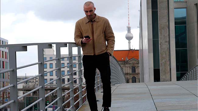 An actor of rokafilms walking in the street of Berlin in Germany